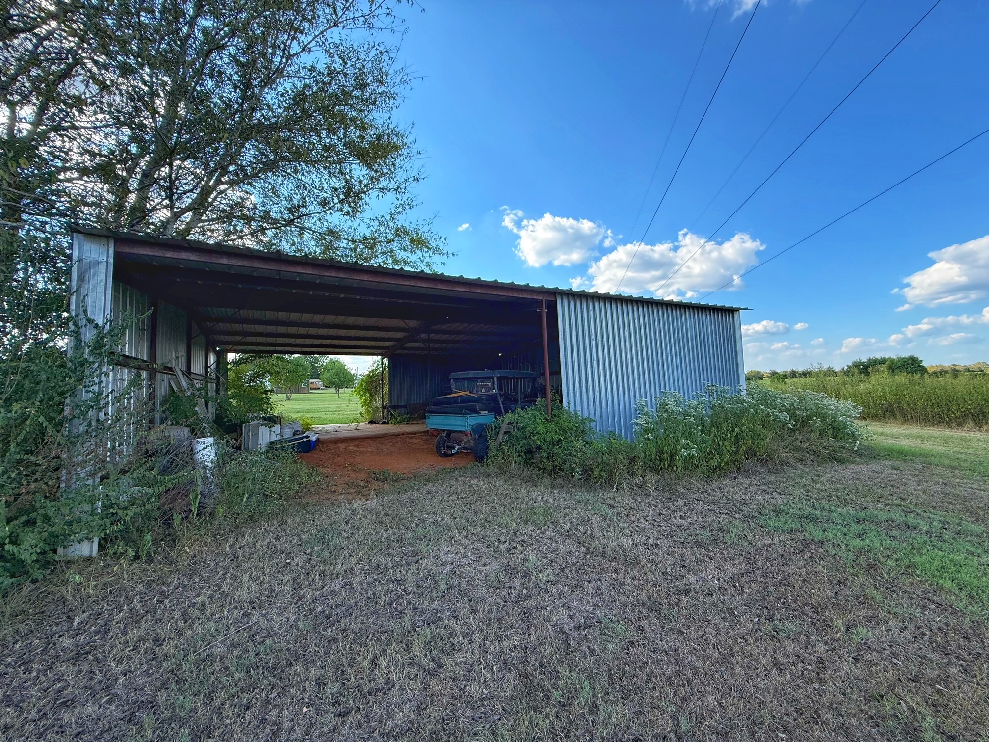 9496 Batson Road Normangee, TX 77871 - Photo 23 of 25 a view of a house with backyard and garden