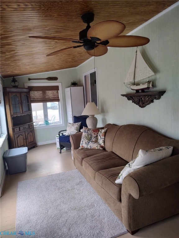 777 Marsh Pungo Road Locust Hill, VA 23092 - Photo 46 of 46 Living area with light wood-style flooring, a vaulted wood ceiling, and ceiling fan