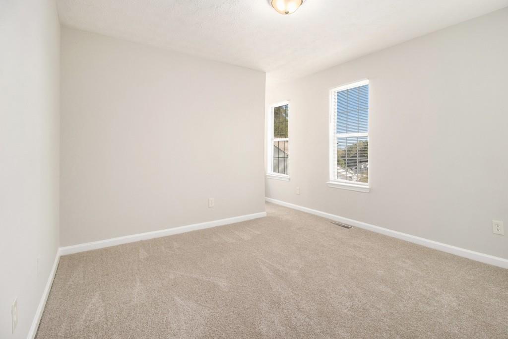 3521 Kingswood Trail Decatur, GA 30034 - Photo 17 of 26 an empty room with windows