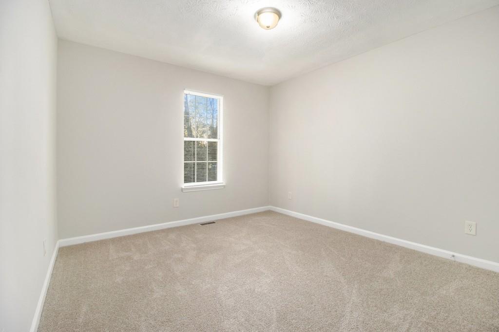 3521 Kingswood Trail Decatur, GA 30034 - Photo 21 of 26 an empty room with a window