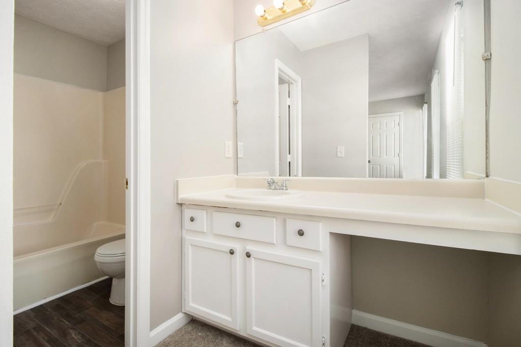 3521 Kingswood Trail Decatur, GA 30034 - Photo 5 of 26 a bathroom with a sink a toilet and shower