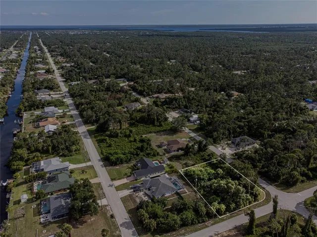 an aerial view of residential house with outdoor space