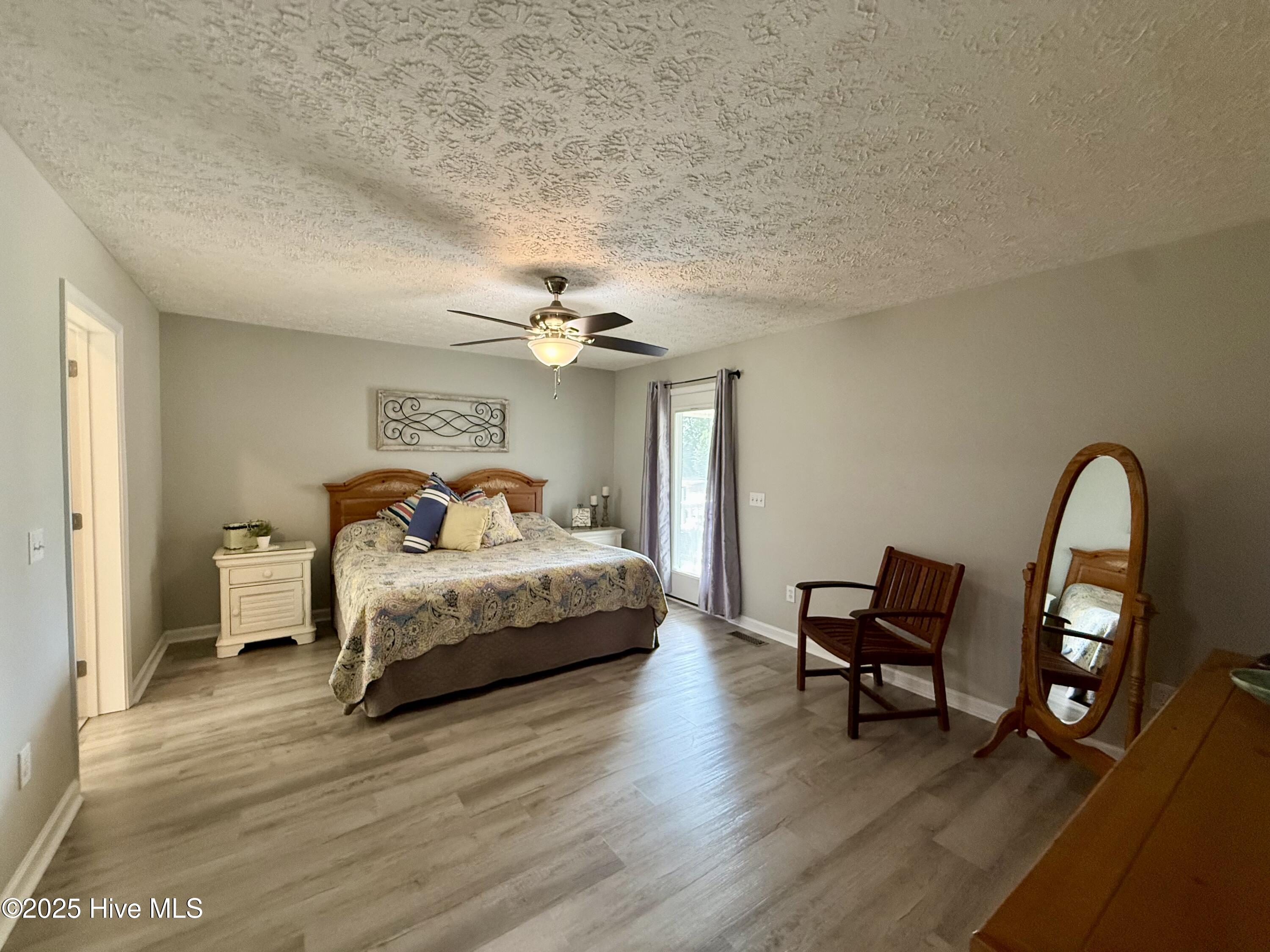 119 Cowpen Neck Road Edenton, NC 27932 - Photo 17 of 39 Owners suite, walk in closet to the left & bathroom