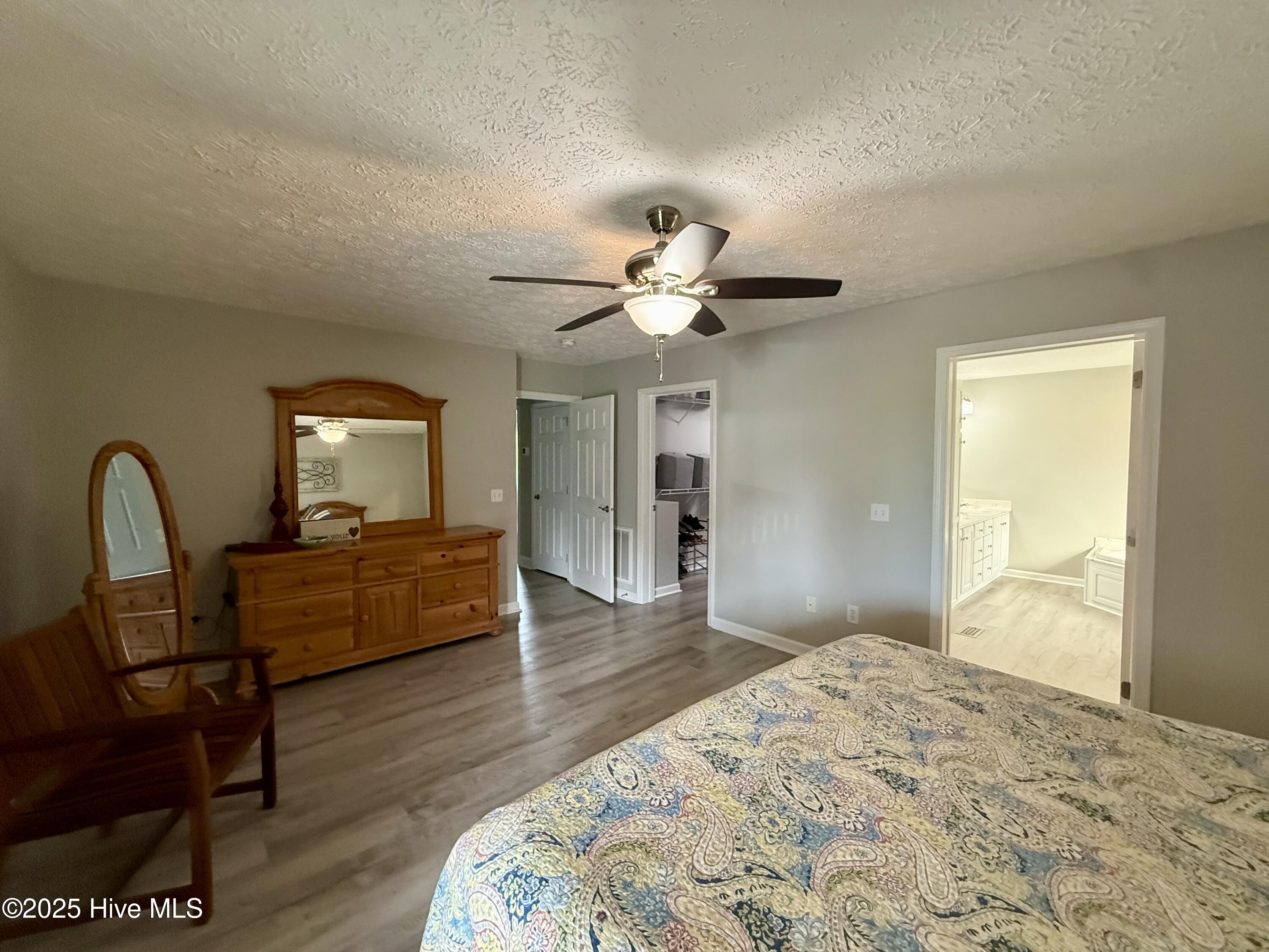 119 Cowpen Neck Road Edenton, NC 27932 - Photo 19 of 39 Owners suite: porch door to the left, bathroom & walk in closet to the right