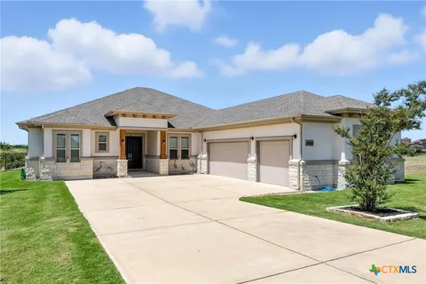 a front view of house with yard