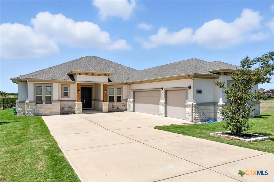 a front view of house with yard