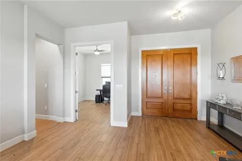wooden floor and closet in a room