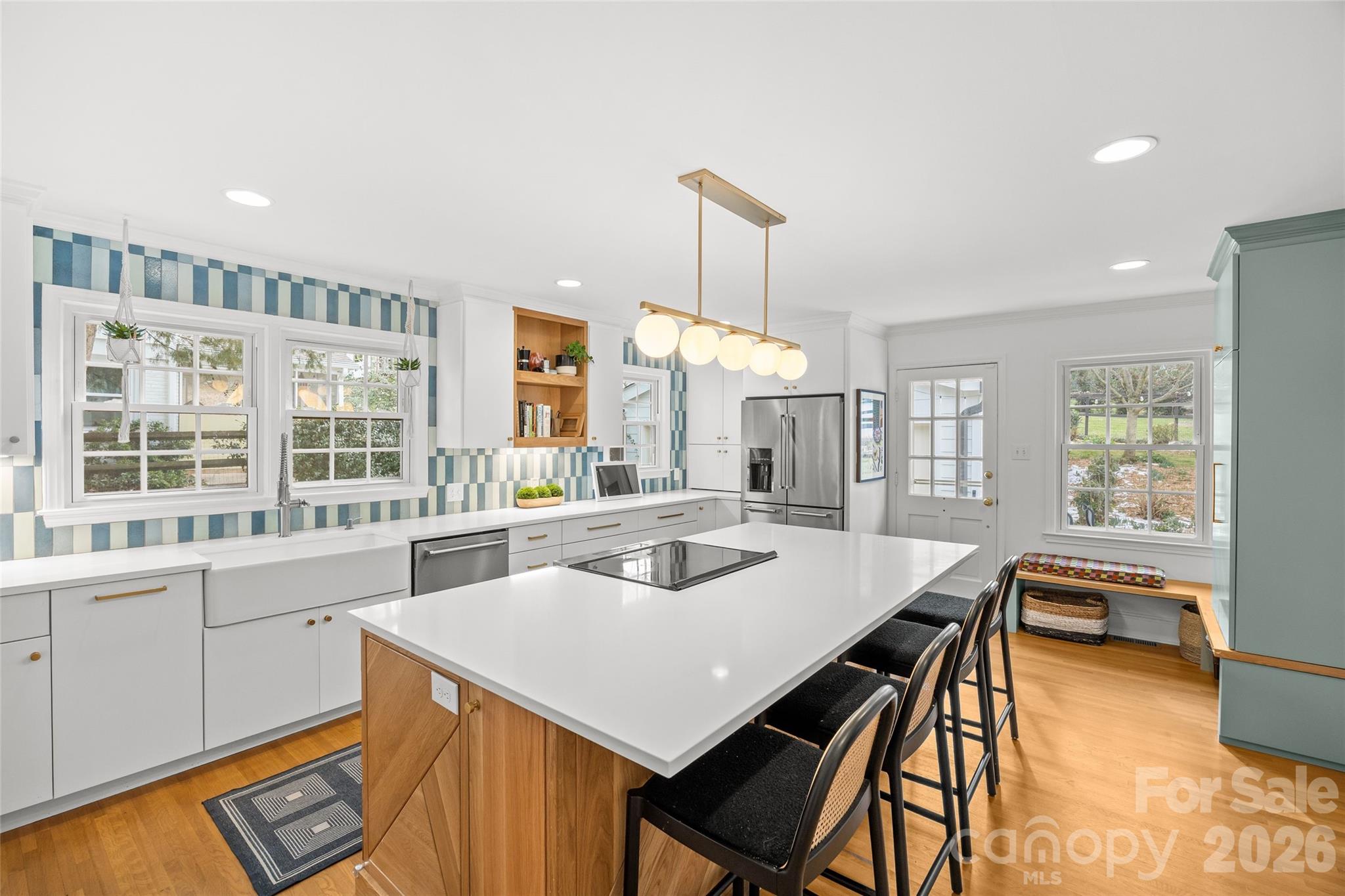 2732 Burnt Mill Road Charlotte, NC 28210 - Photo 12 of 43 a kitchen with a table chairs and wooden floor
