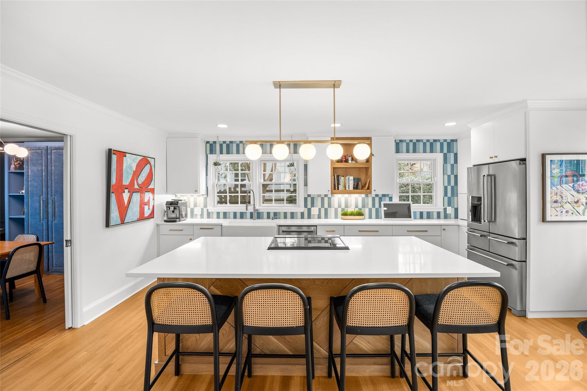2732 Burnt Mill Road Charlotte, NC 28210 - Photo 13 of 43 a dining room with stainless steel appliances granite countertop a dining table and chairs with wooden floor