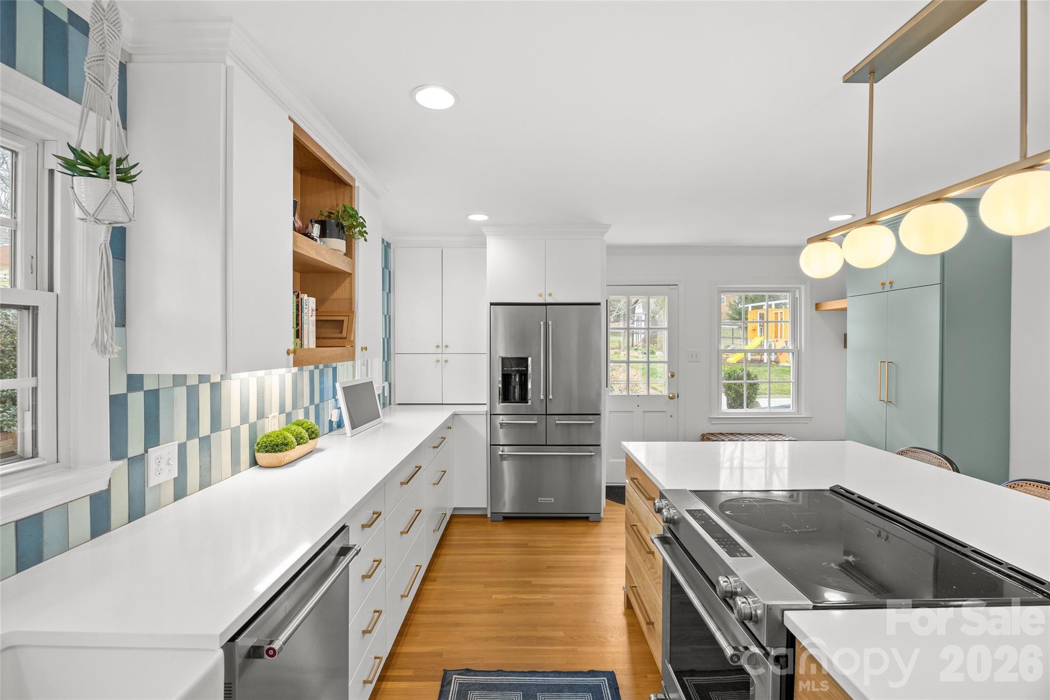2732 Burnt Mill Road Charlotte, NC 28210 - Photo 15 of 43 a kitchen with kitchen island granite countertop lots of counter top space and stainless steel appliances