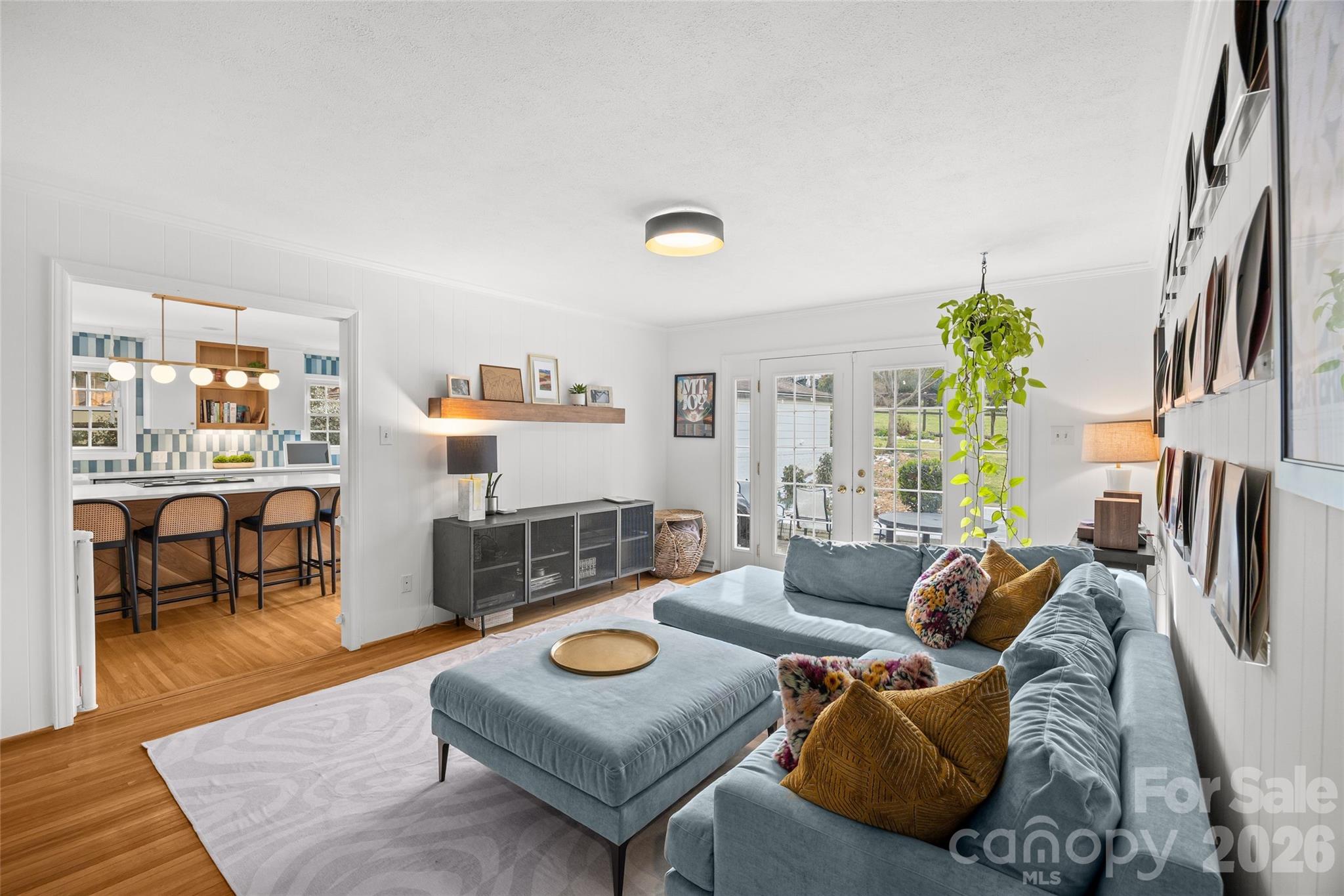 2732 Burnt Mill Road Charlotte, NC 28210 - Photo 19 of 43 a living room with furniture a rug and a table