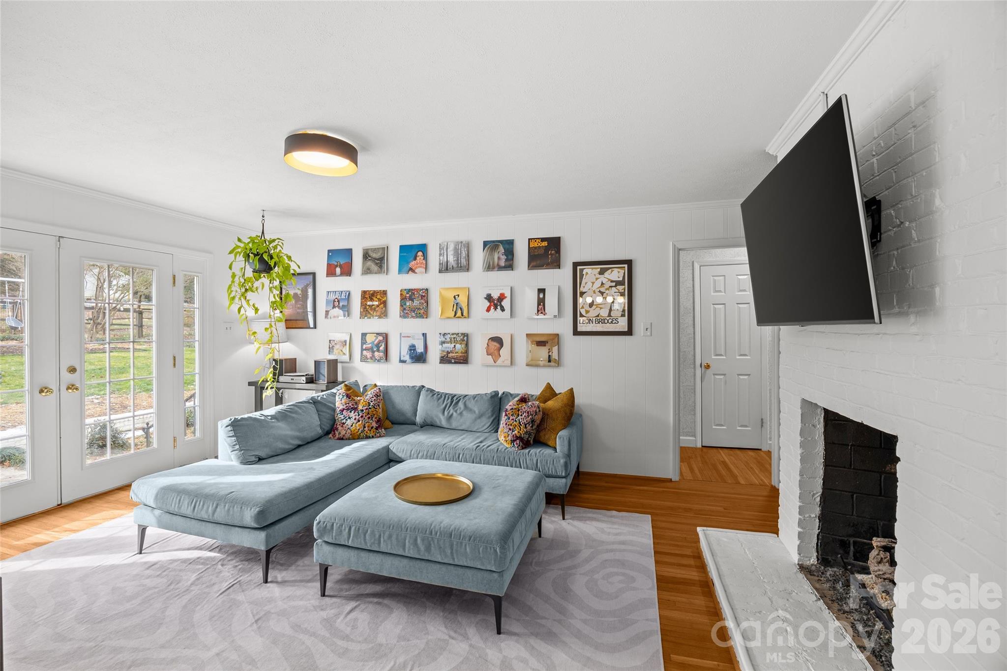 2732 Burnt Mill Road Charlotte, NC 28210 - Photo 20 of 43 a living room with furniture and a flat screen tv