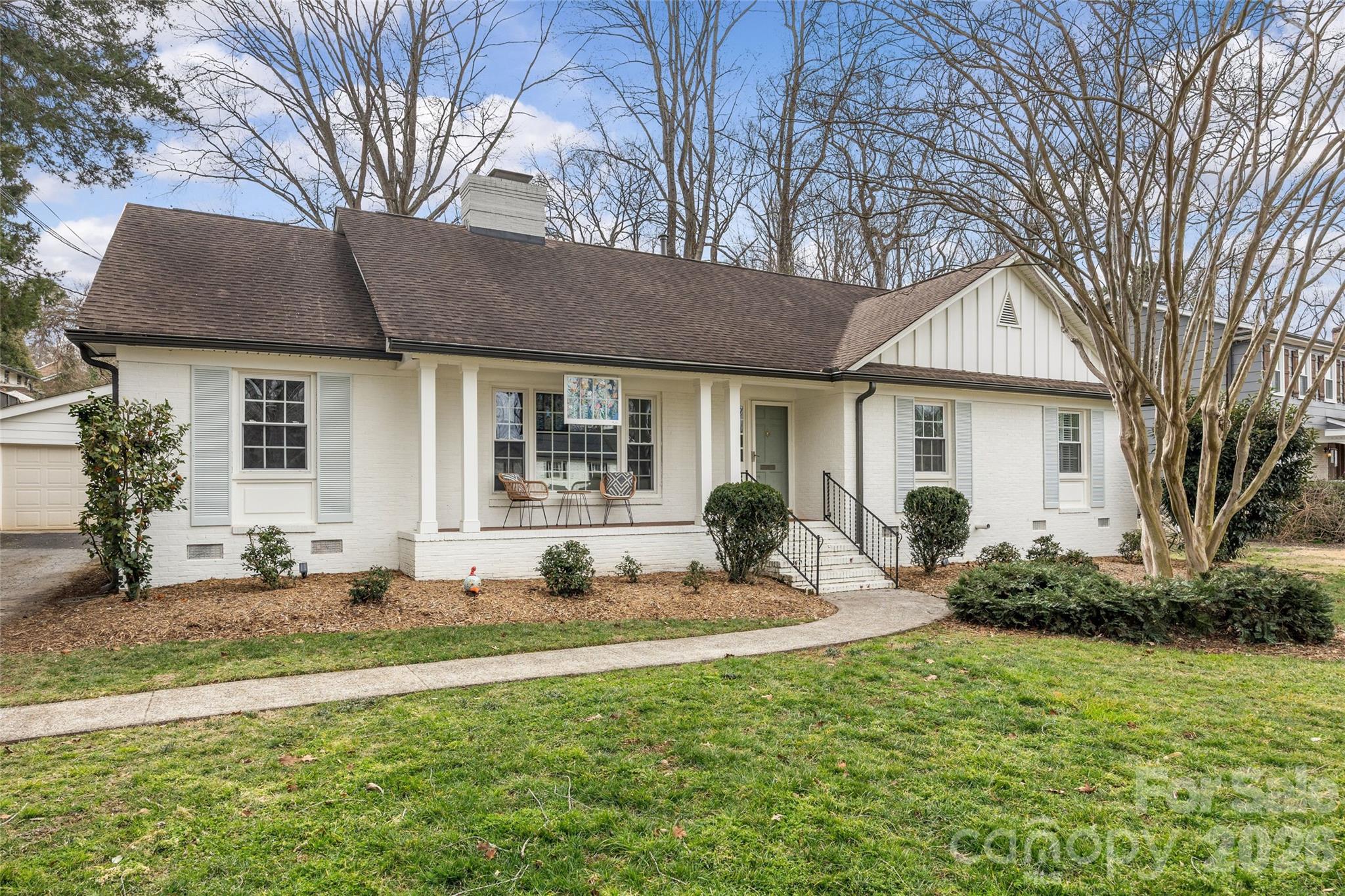 2732 Burnt Mill Road Charlotte, NC 28210 - Photo 2 of 43 a front view of a house with yard outdoor seating and yard