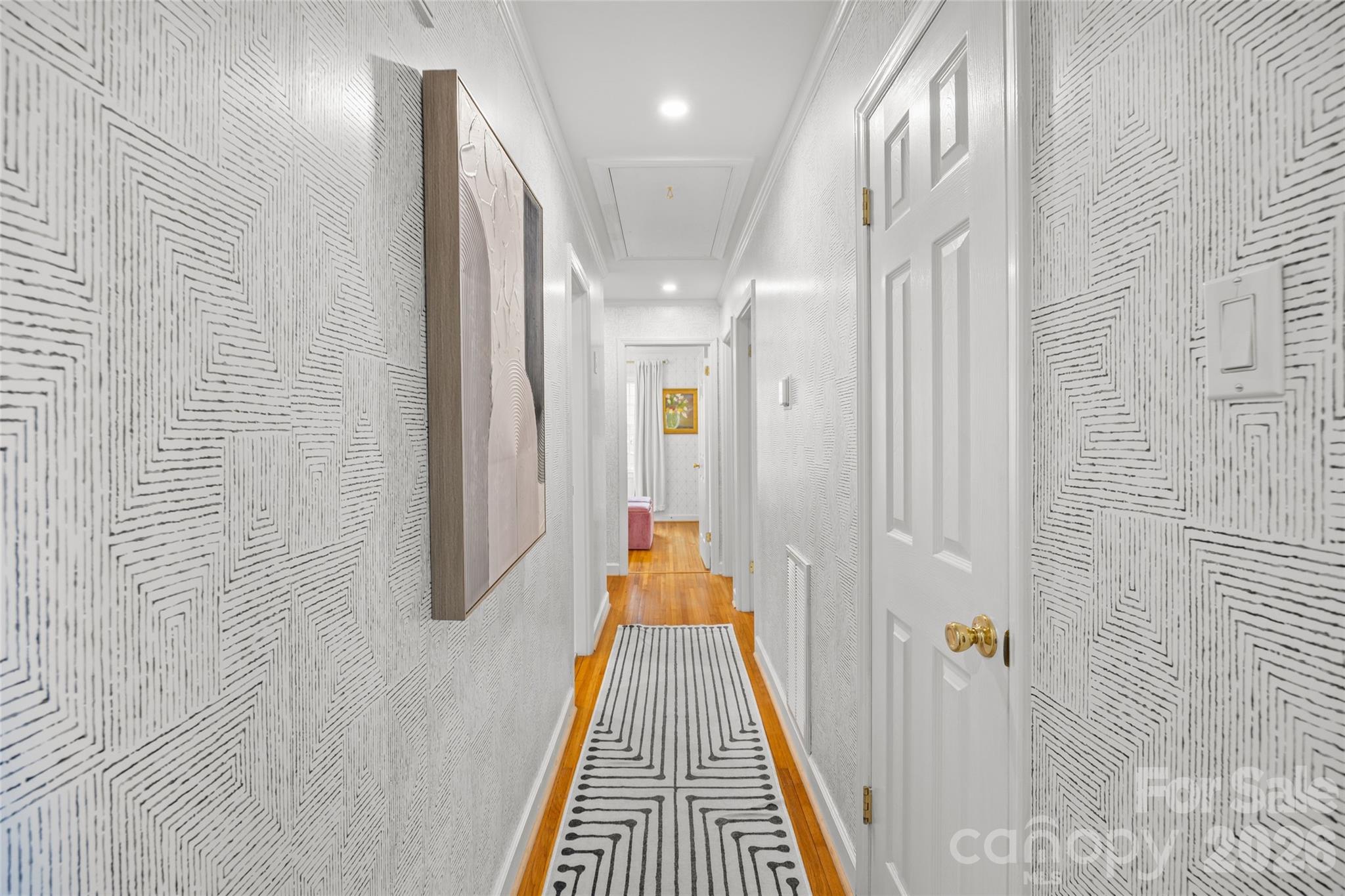 2732 Burnt Mill Road Charlotte, NC 28210 - Photo 22 of 43 a view of a hallway with wooden floor