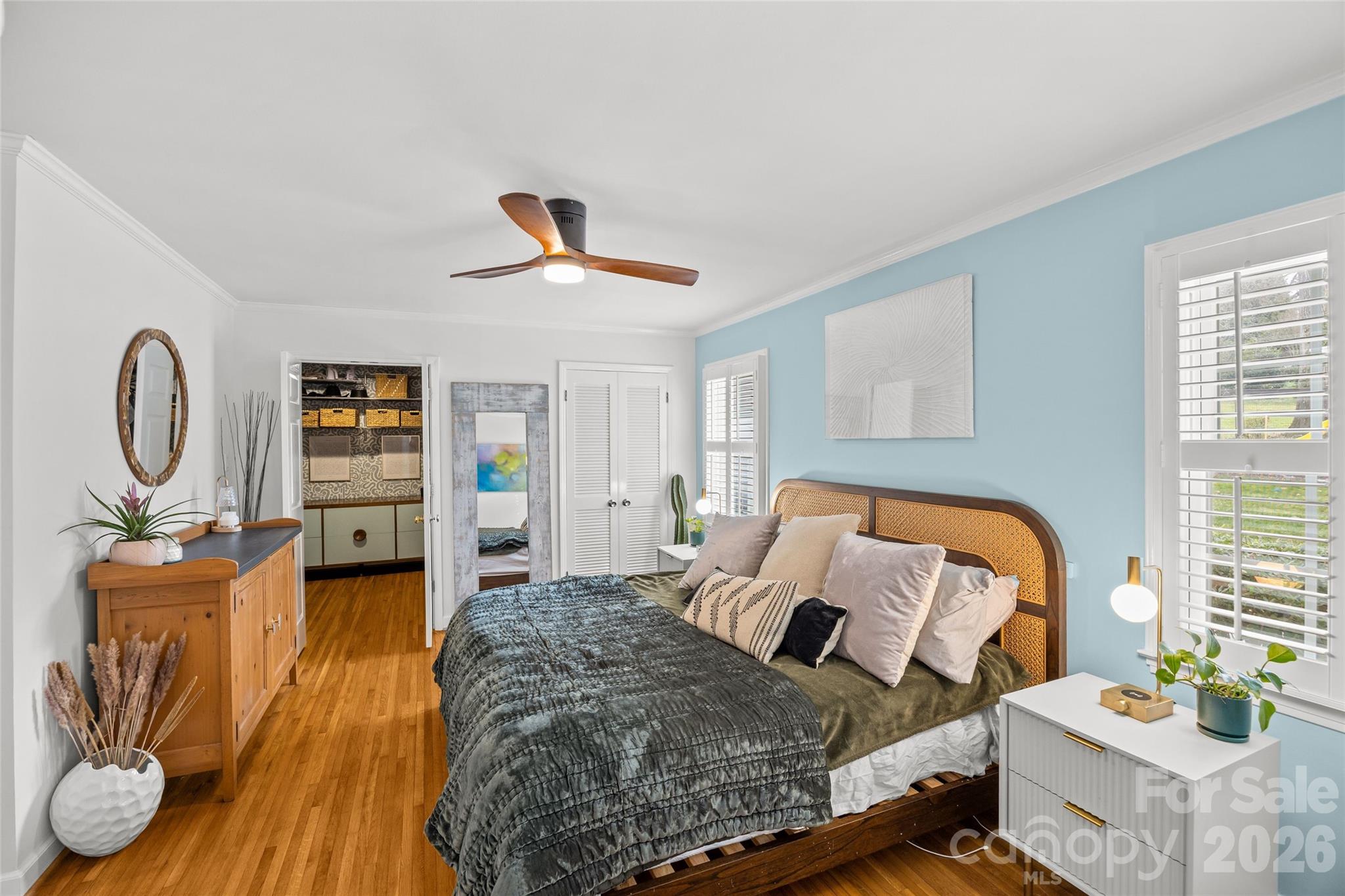 2732 Burnt Mill Road Charlotte, NC 28210 - Photo 24 of 43 a bedroom with a bed a dresser and book shelf