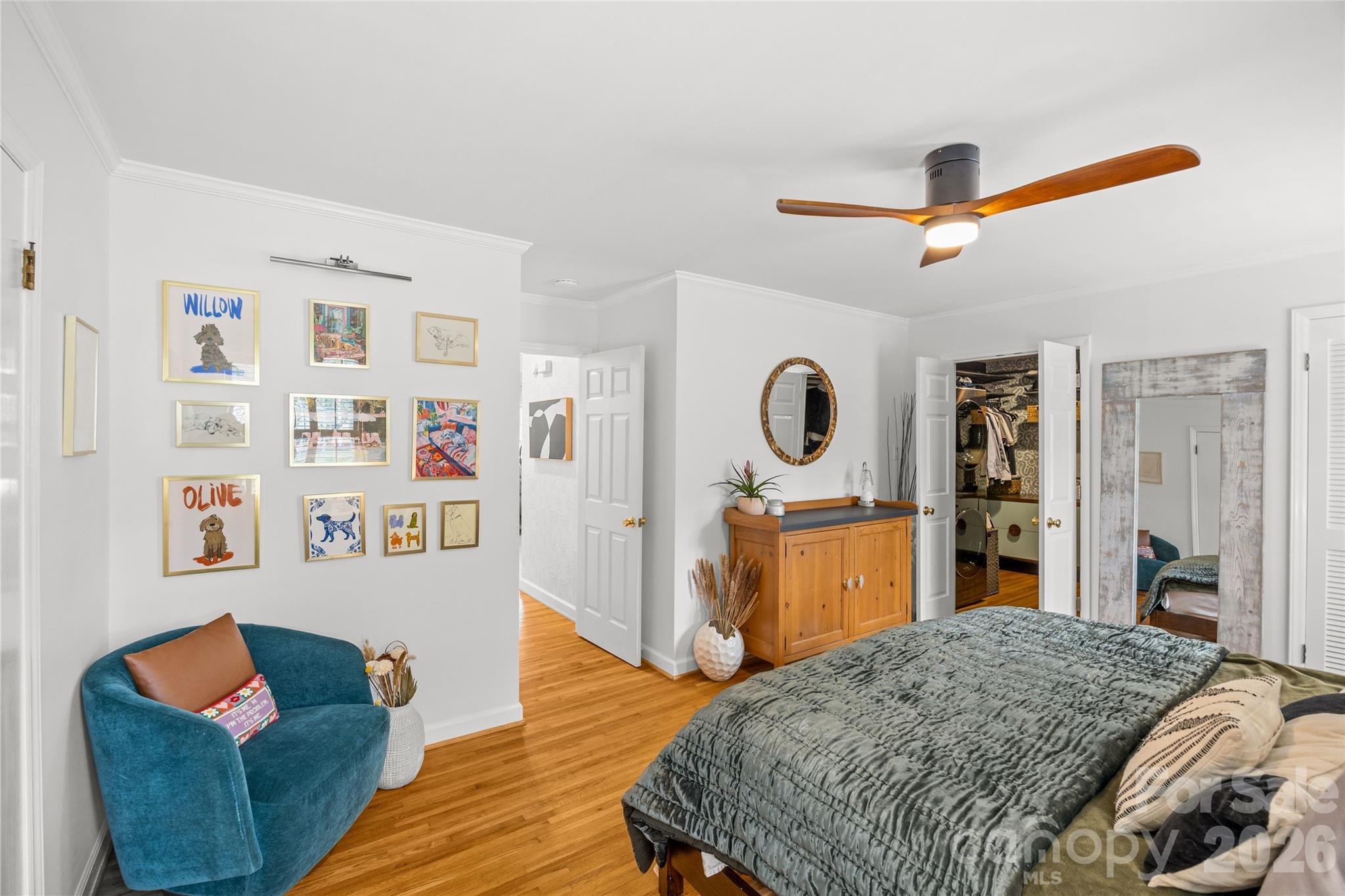 2732 Burnt Mill Road Charlotte, NC 28210 - Photo 25 of 43 a bedroom with a bed and wooden floor