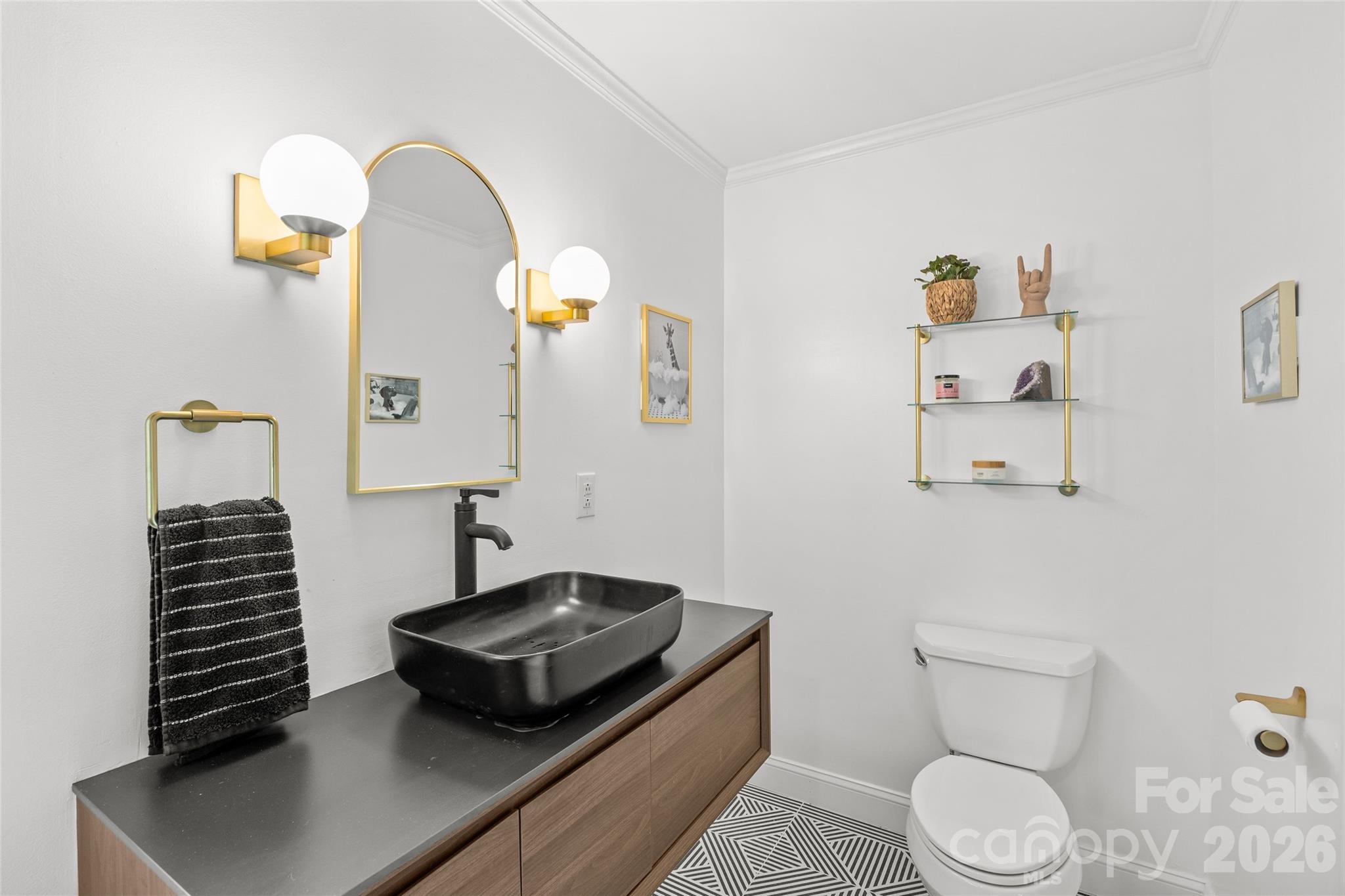 2732 Burnt Mill Road Charlotte, NC 28210 - Photo 27 of 43 a bathroom with a toilet a sink and mirror