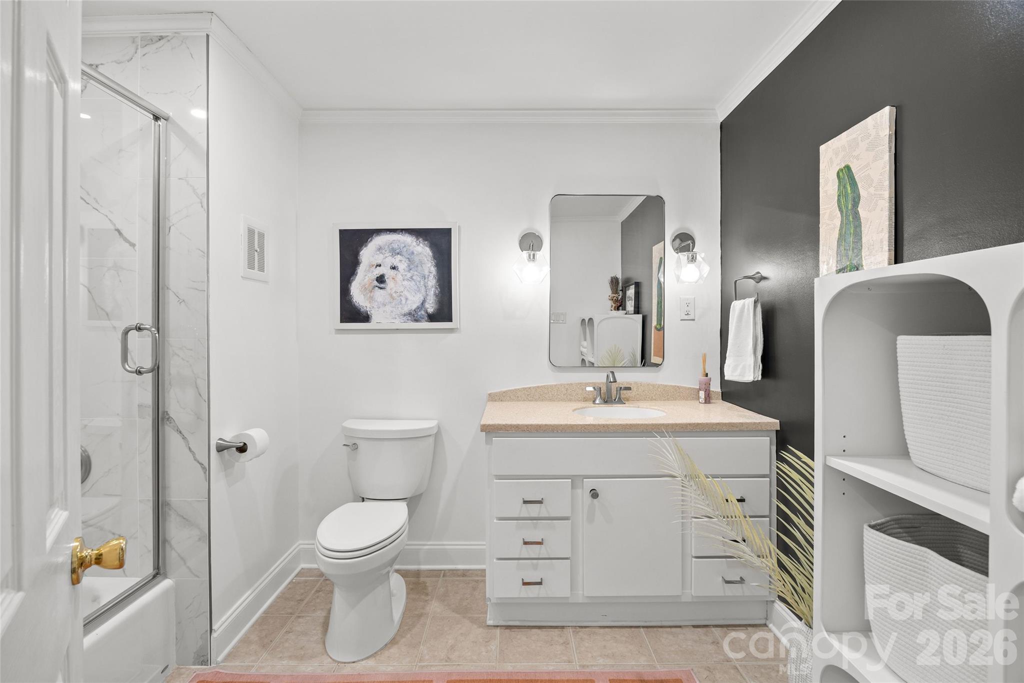 2732 Burnt Mill Road Charlotte, NC 28210 - Photo 28 of 43 a bathroom with a toilet sink and mirror