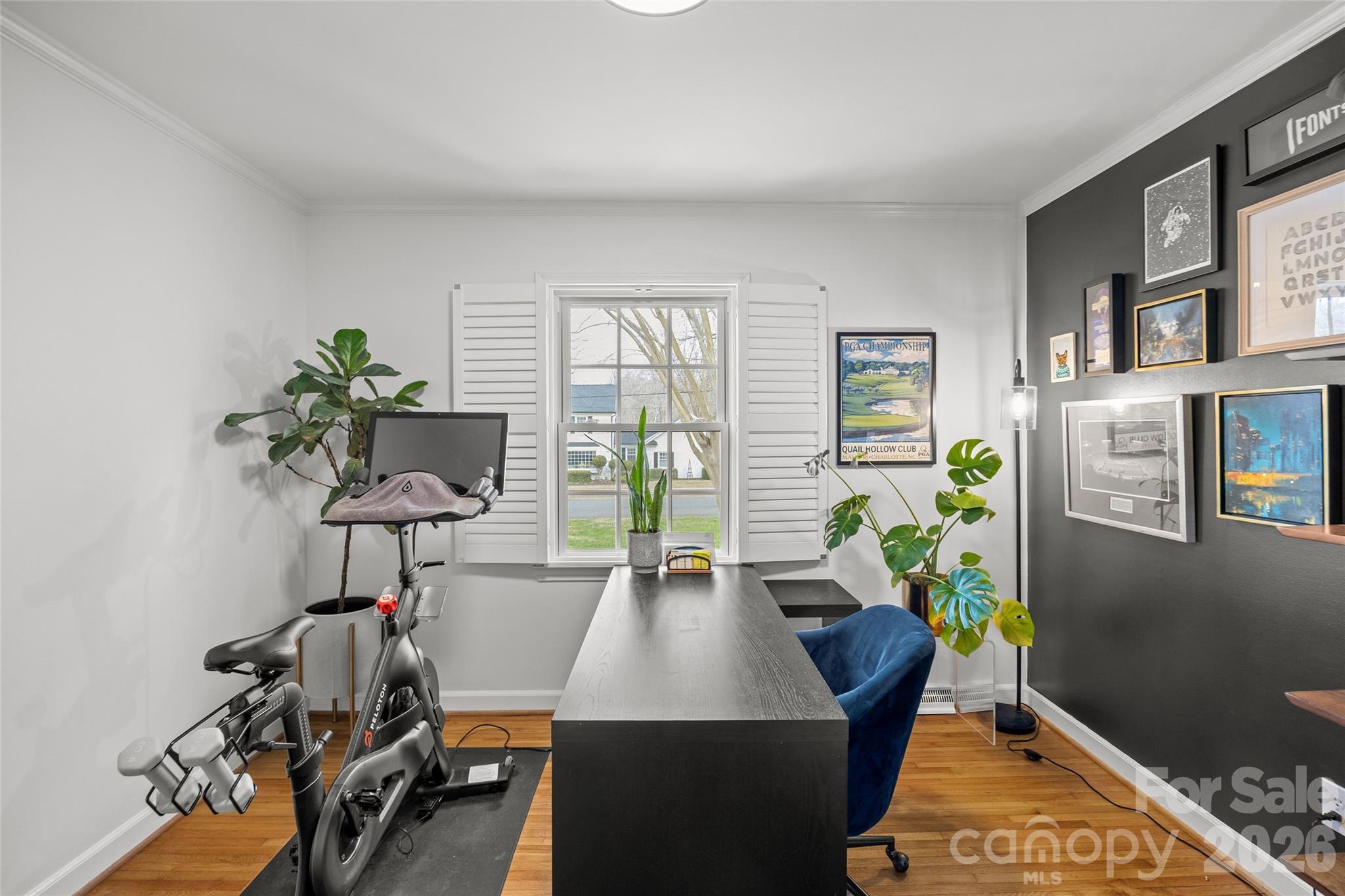 2732 Burnt Mill Road Charlotte, NC 28210 - Photo 32 of 43 a room with furniture a chandelier and a window