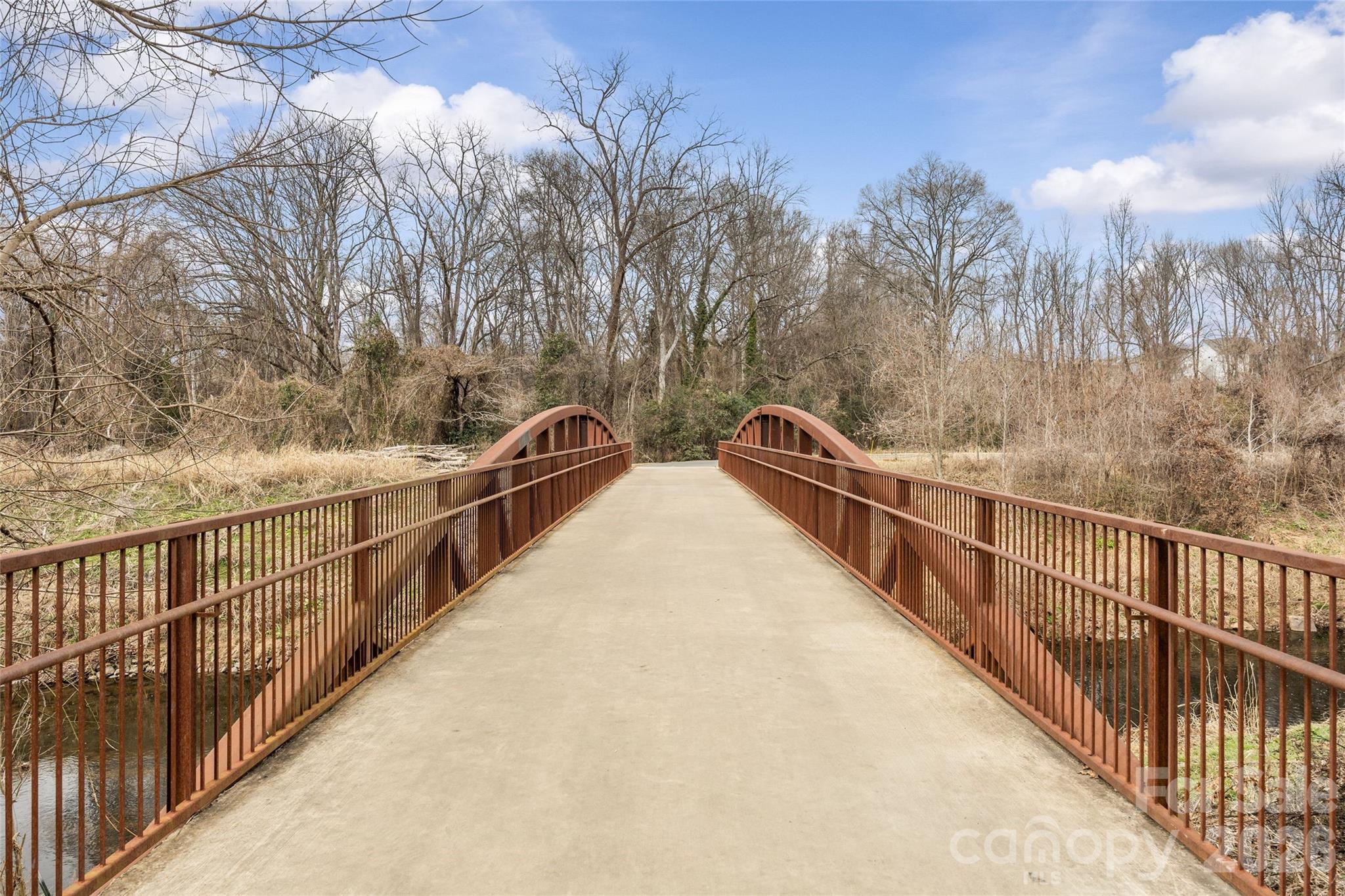 2732 Burnt Mill Road Charlotte, NC 28210 - Photo 43 of 43 a view of a balcony with wooden stairs