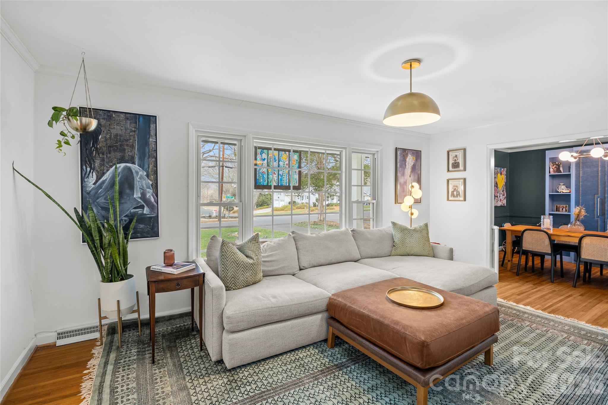 2732 Burnt Mill Road Charlotte, NC 28210 - Photo 7 of 43 a living room with furniture and a wooden floor
