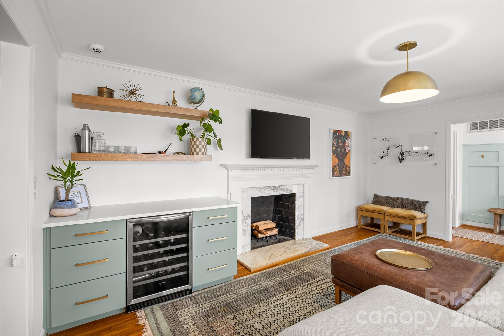 2732 Burnt Mill Road Charlotte, NC 28210 - Photo 9 of 43 a living room with furniture and a fireplace