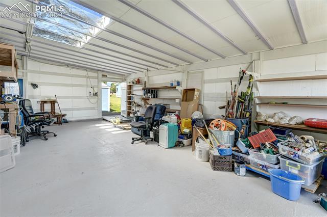5845 Peerless Farms Road Peyton, CO 80831 - Photo 46 of 50 View of garage