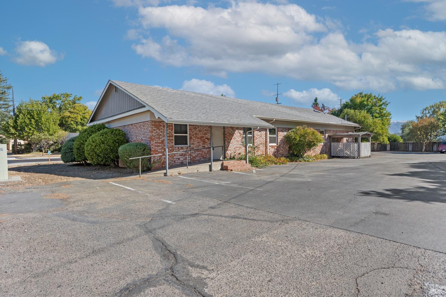 195 Low Gap Road Ukiah, CA 95482 - Photo 11 of 13 a view of a house with a yard and fence