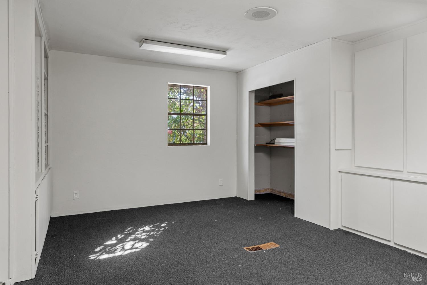 195 Low Gap Road Ukiah, CA 95482 - Photo 6 of 13 a view of an empty room with a window