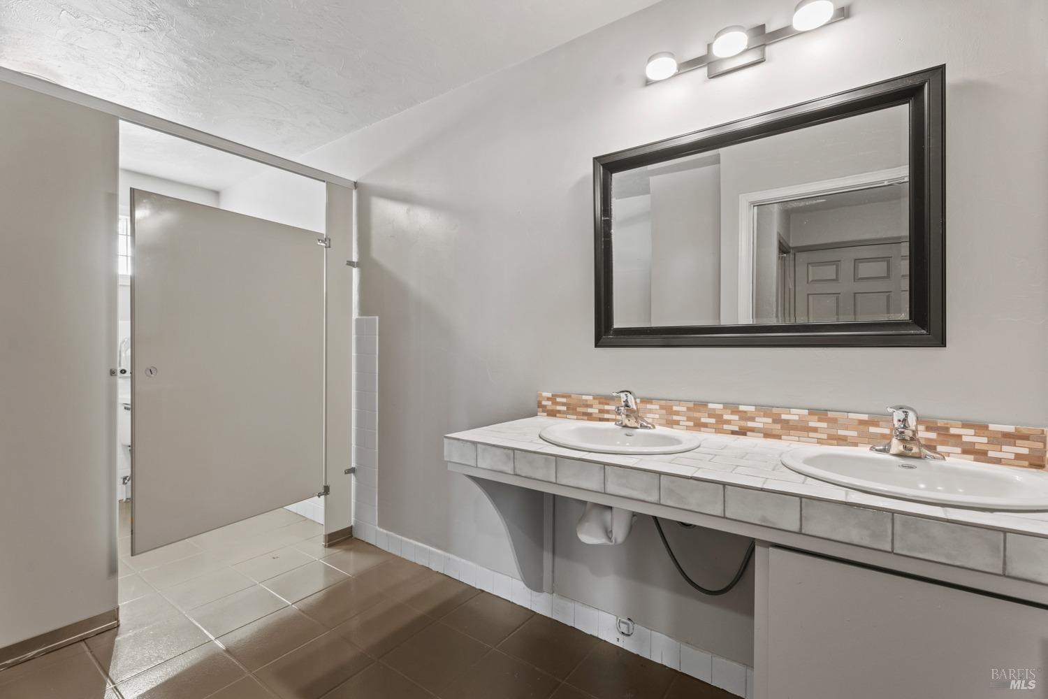 195 Low Gap Road Ukiah, CA 95482 - Photo 7 of 13 a bathroom with a sink and a mirror