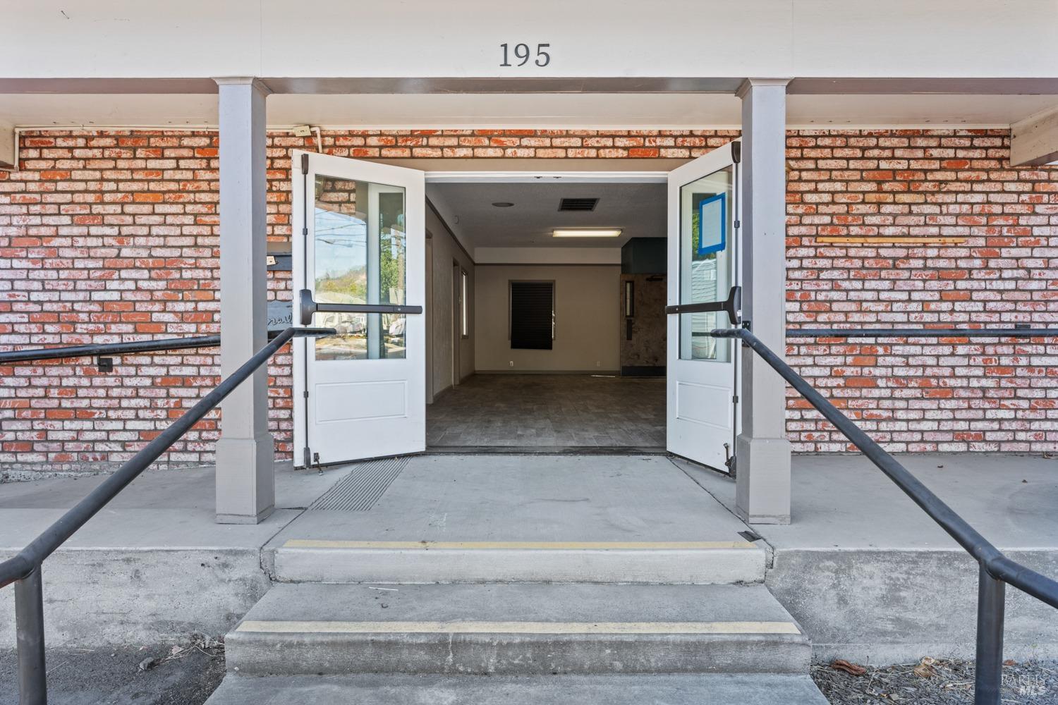 195 Low Gap Road Ukiah, CA 95482 - Photo 9 of 13 a view of a livingroom with wooden floor and staircase