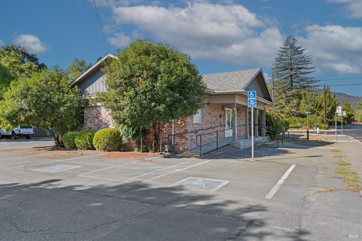 195 Low Gap Road Ukiah, CA 95482 - Photo 10 of 13 a front view of a house with a yard and potted plants
