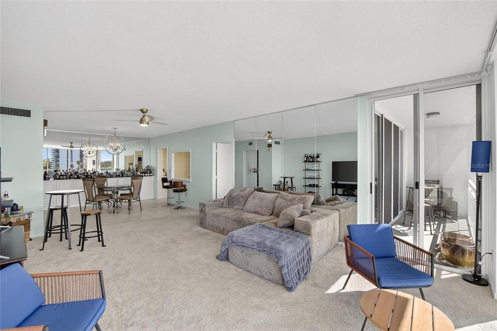 100 Pierce Street, Unit 703 Clearwater, FL 33756 - Photo 17 of 70 a living room with furniture and a large window