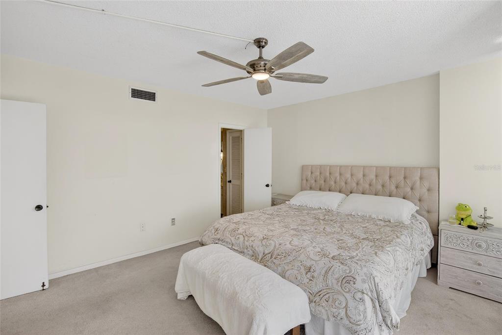 100 Pierce Street, Unit 703 Clearwater, FL 33756 - Photo 21 of 70 a bedroom with a bed and window