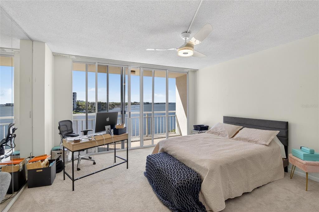 100 Pierce Street, Unit 703 Clearwater, FL 33756 - Photo 28 of 70 a bedroom with a bed furniture and a window