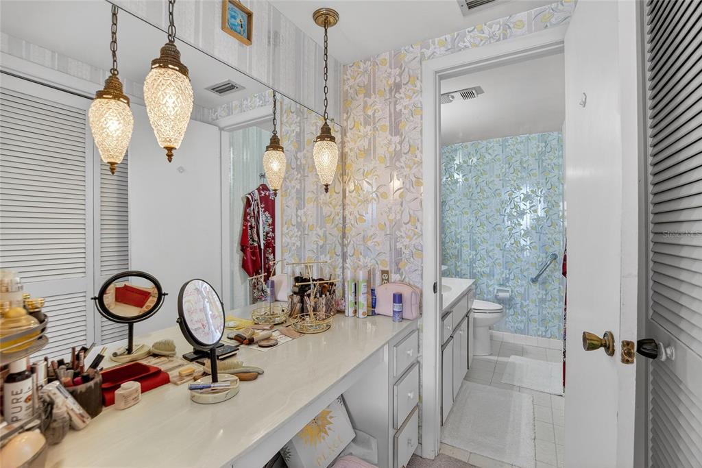 100 Pierce Street, Unit 703 Clearwater, FL 33756 - Photo 34 of 70 a bathroom with a sink vanity and a mirror