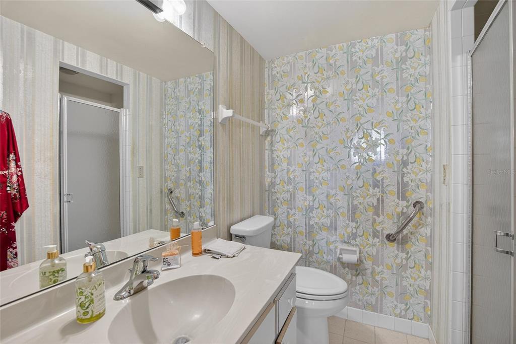 100 Pierce Street, Unit 703 Clearwater, FL 33756 - Photo 35 of 70 a bathroom with a sink toilet and shower