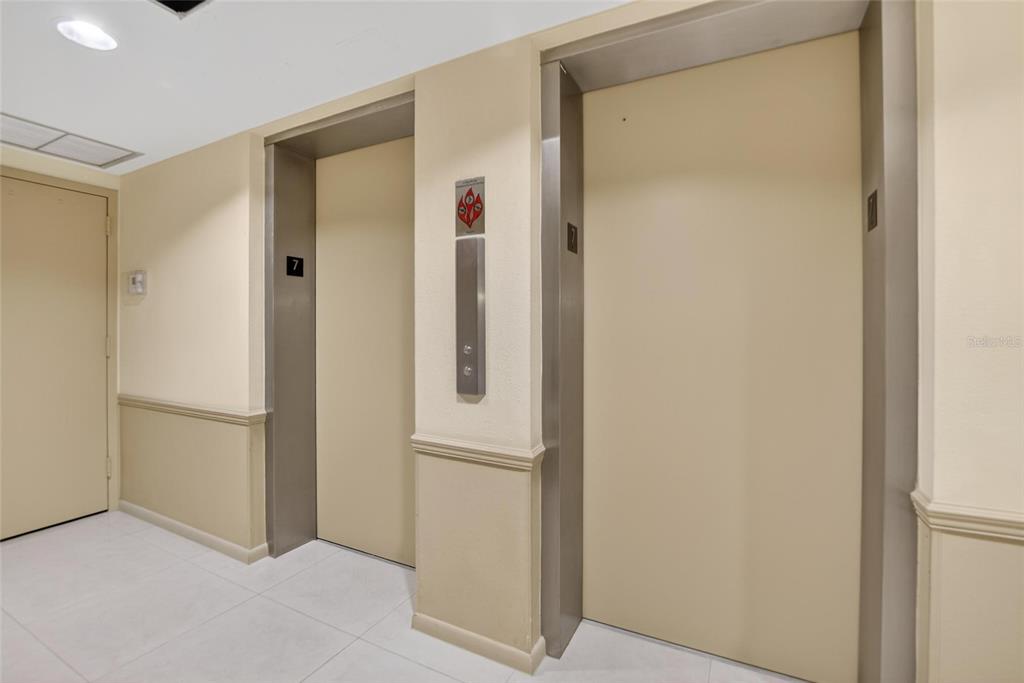 100 Pierce Street, Unit 703 Clearwater, FL 33756 - Photo 37 of 70 a view of elevator with hallway