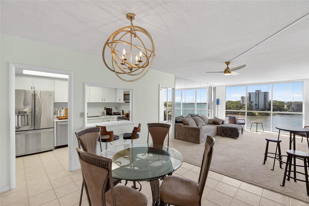 100 Pierce Street, Unit 703 Clearwater, FL 33756 - Photo 9 of 70 a view of a dining room with furniture window and outside view