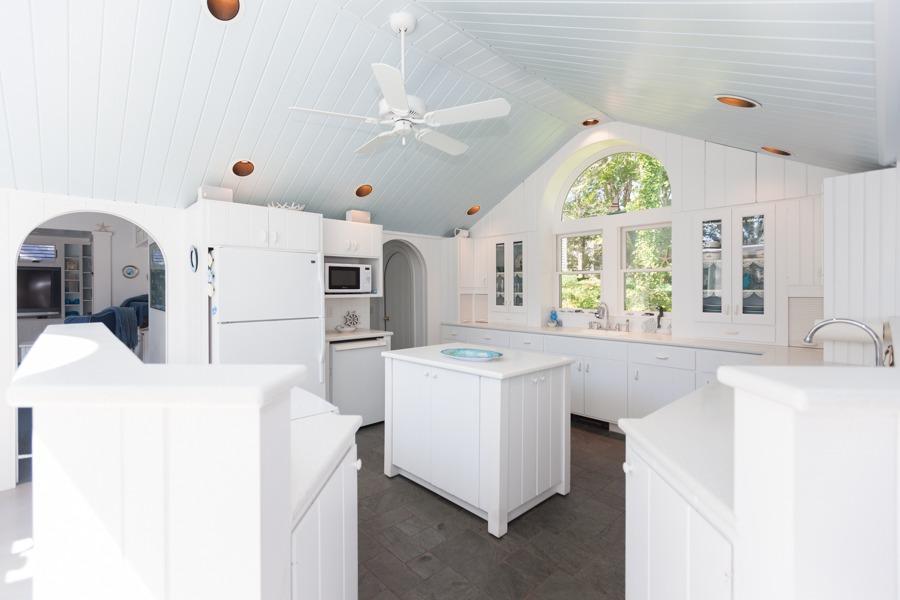 5 Kidd Way Orleans, MA 02653 - Photo 11 of 35 a kitchen with furniture a window and stainless steel appliances