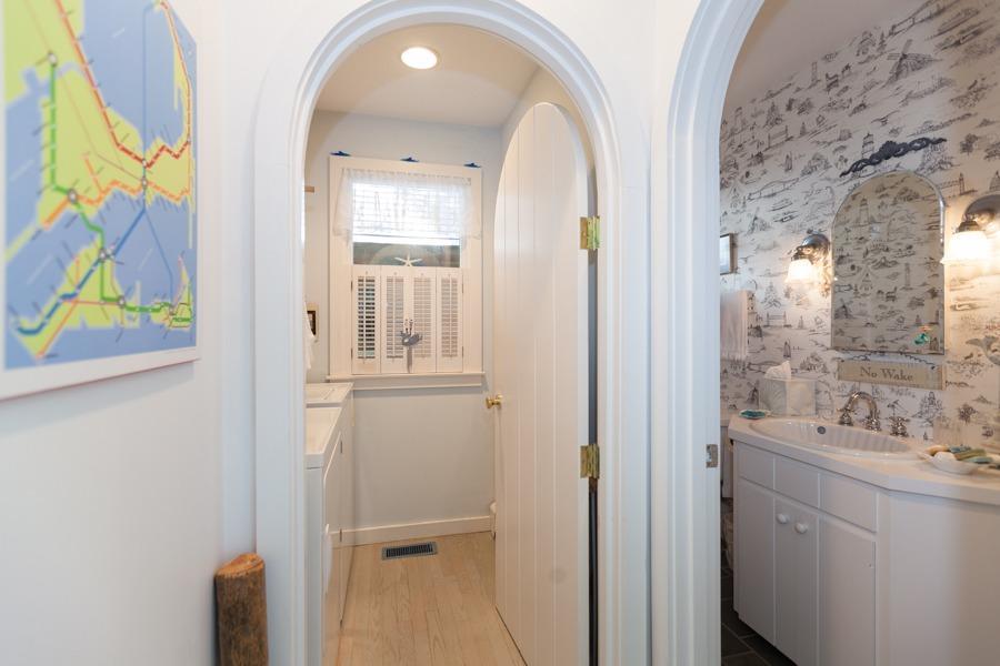 5 Kidd Way Orleans, MA 02653 - Photo 17 of 35 a bathroom with a sink and a mirror