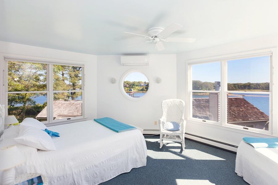 5 Kidd Way Orleans, MA 02653 - Photo 18 of 35 a bedroom with a bed and a window