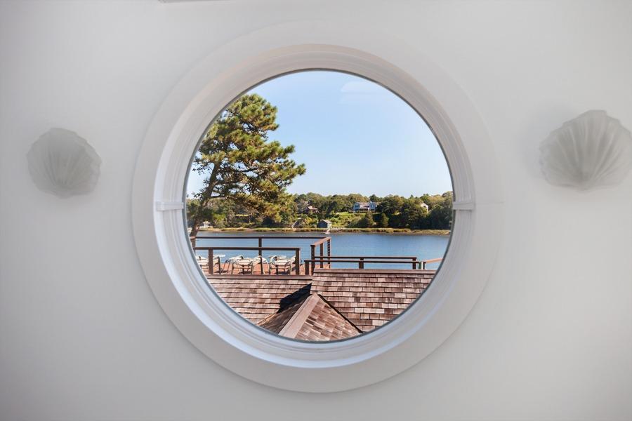 5 Kidd Way Orleans, MA 02653 - Photo 20 of 35 a view of a swimming pool with a window