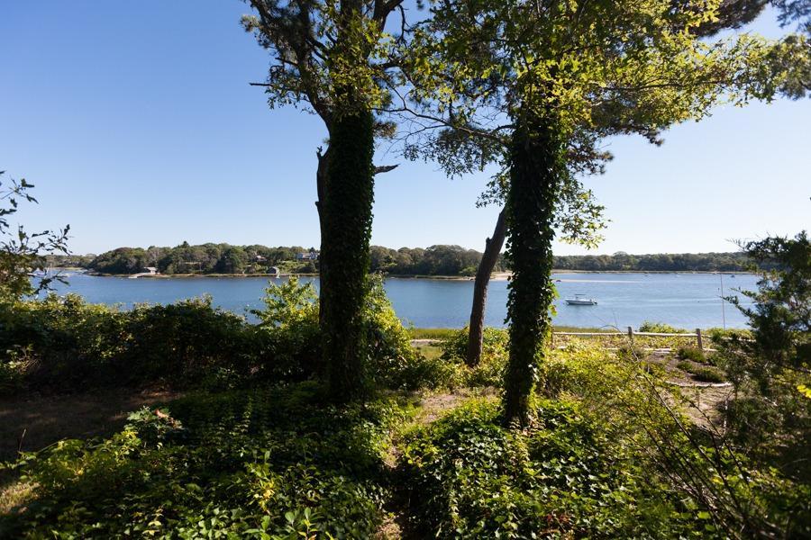 5 Kidd Way Orleans, MA 02653 - Photo 25 of 35 a view of a lake with a big yard