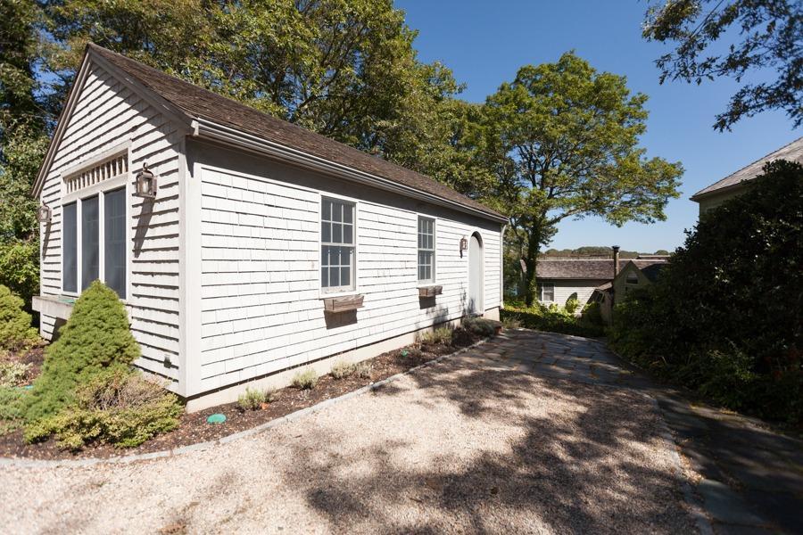 5 Kidd Way Orleans, MA 02653 - Photo 35 of 35 a back view of a house with a yard