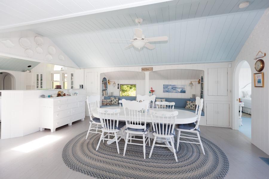 5 Kidd Way Orleans, MA 02653 - Photo 8 of 35 a view of a dining room with furniture and wooden floor