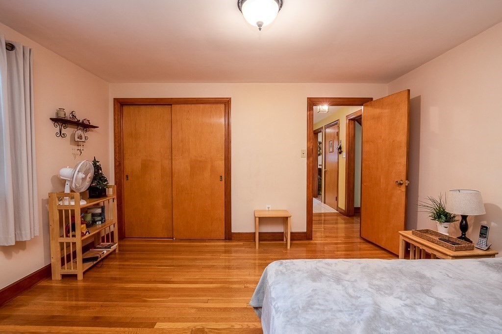 8 Franklin Terrace Boston, MA 02136 - Photo 12 of 30 a bedroom with furniture and wooden floor