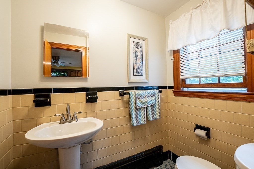 8 Franklin Terrace Boston, MA 02136 - Photo 13 of 30 a bathroom with a sink and a mirror