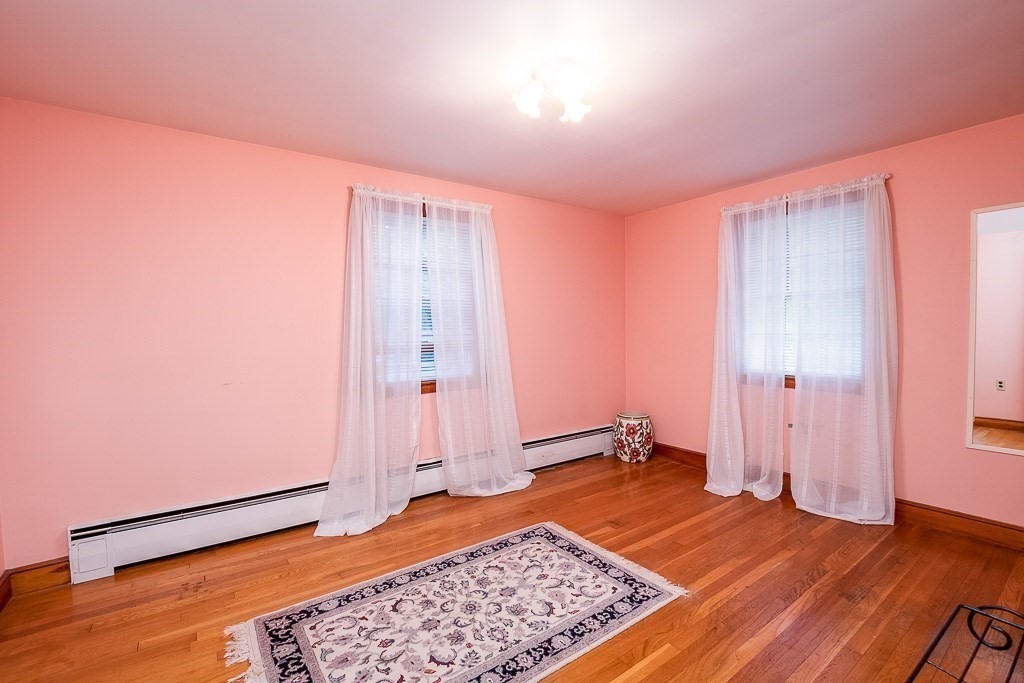 8 Franklin Terrace Boston, MA 02136 - Photo 22 of 30 a view of a room with wooden floor and a rug