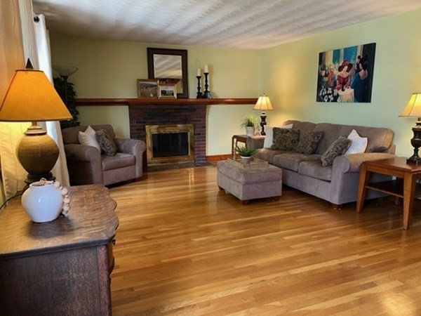 8 Franklin Terrace Boston, MA 02136 - Photo 5 of 30 a living room with furniture and a fireplace